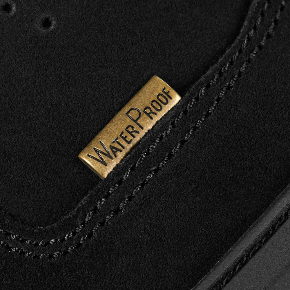 M-TAC Tactical Winter Boots shown in black with rugged soles and reinforced ankle support for outdoor tactical use.