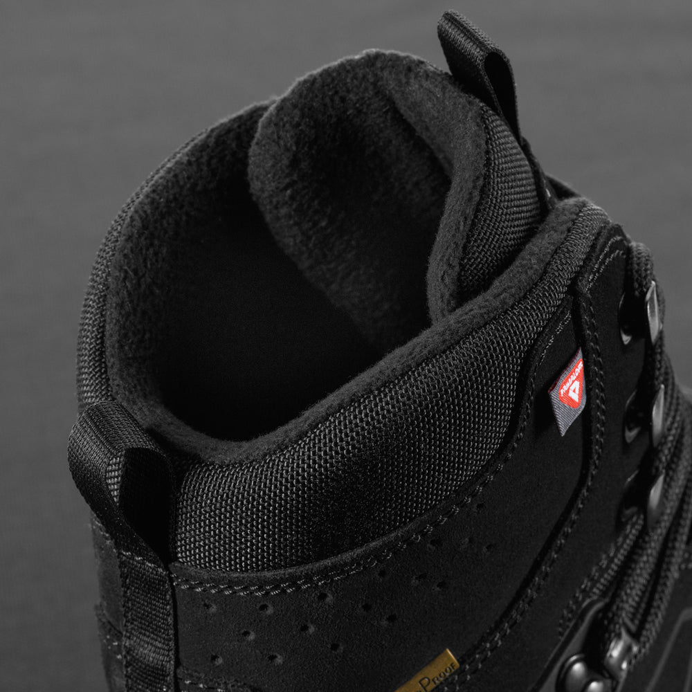 M-Tac tactical winter boots in black with rugged sole and waterproof material, designed for outdoor tactical use.