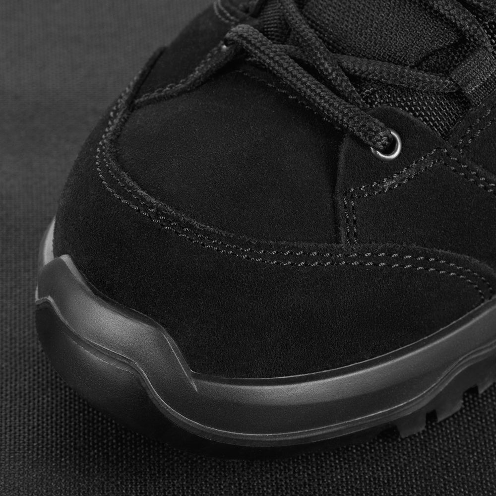 M-Tac tactical winter boots in black with rugged soles, waterproof material, and ankle support, designed for outdoor tactical use.