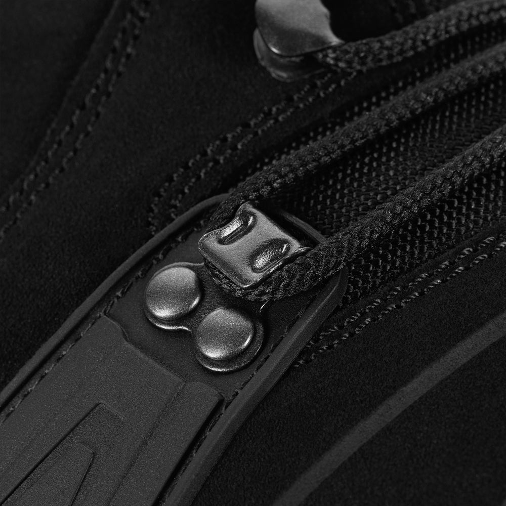 M-Tac tactical winter boots in black with rugged sole, waterproof design, and padded ankle support for cold weather outdoor activities.