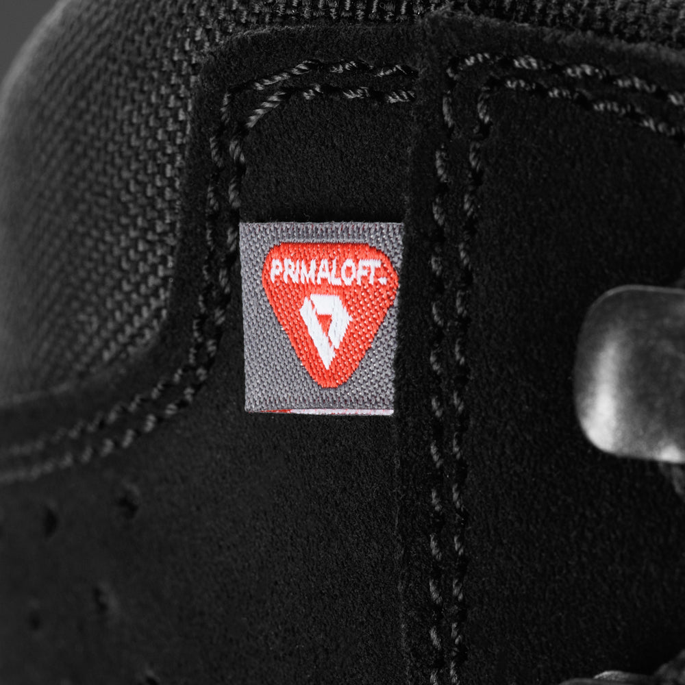 M-Tac tactical winter boots featuring sturdy leather and waterproof design, suitable for rugged outdoor and tactical use.