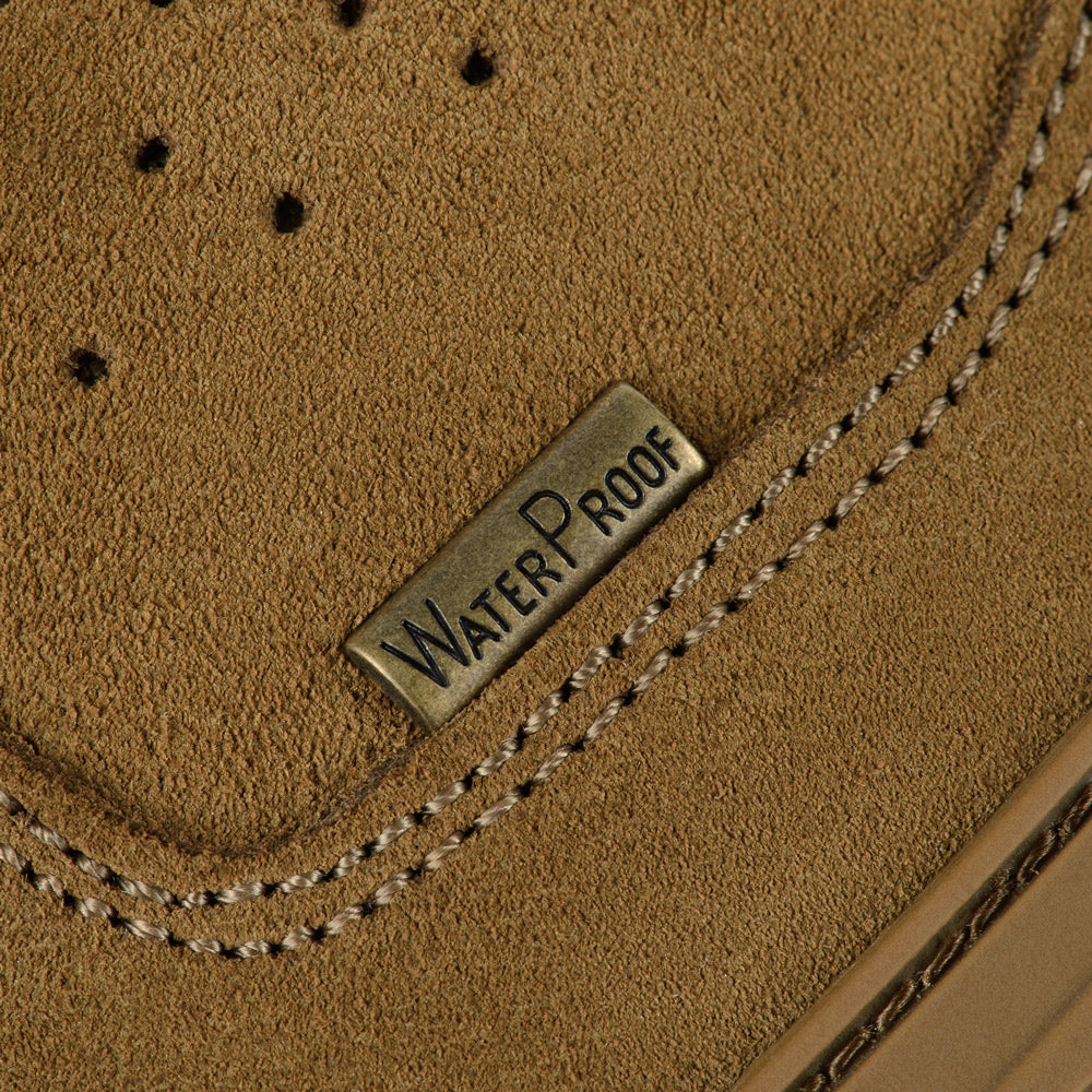 M-Tac tactical winter boots with rugged design, waterproof material, and sturdy sole for outdoor and tactical use.