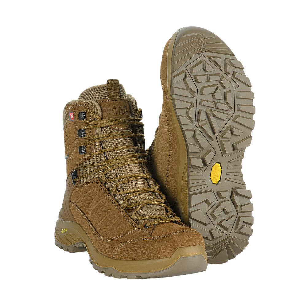 M-Tac tactical winter boots in black with rugged sole and insulated design for outdoor military or tactical use.