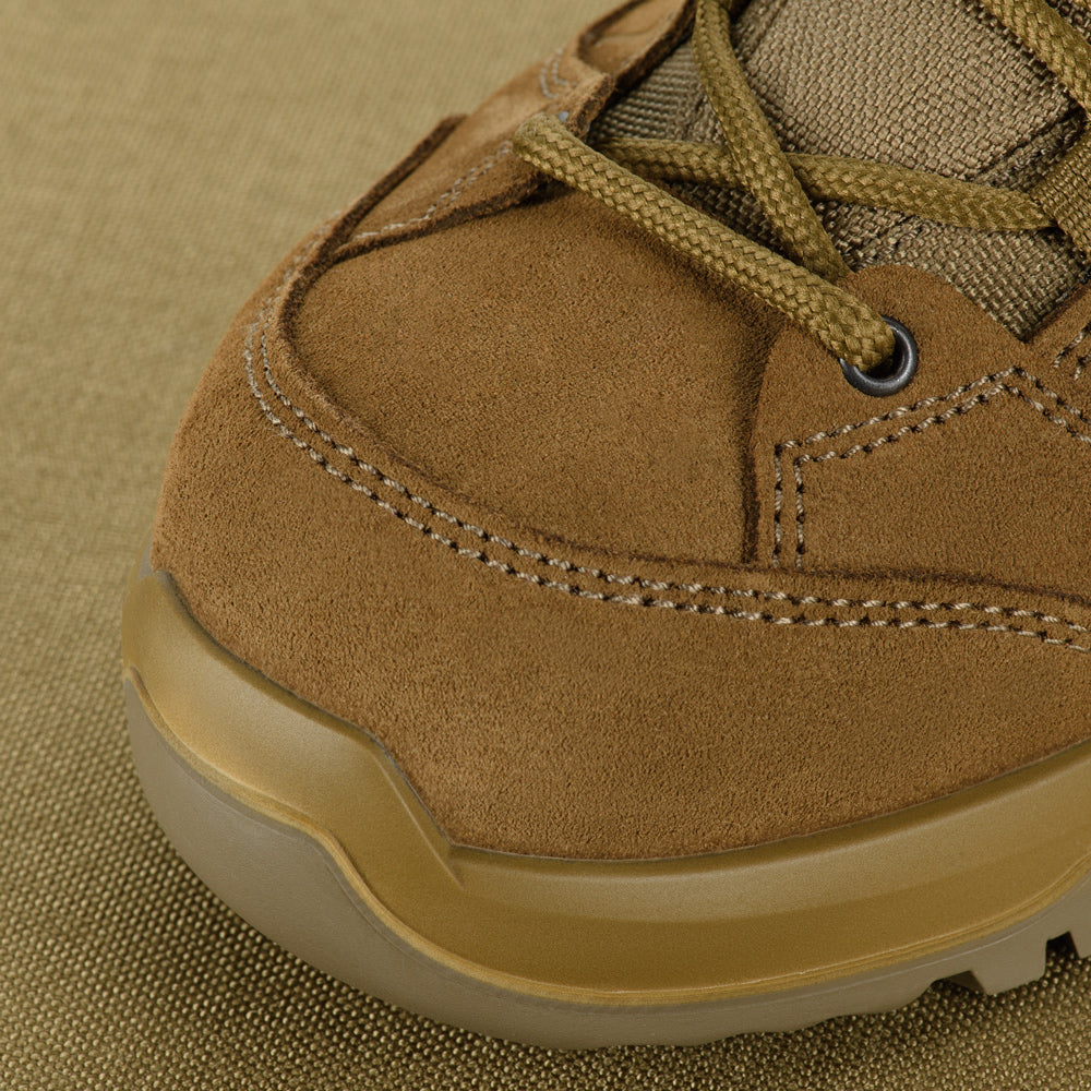 M-Tac tactical winter boots with rugged design, waterproof leather and durable sole suitable for outdoor military or tactical use.