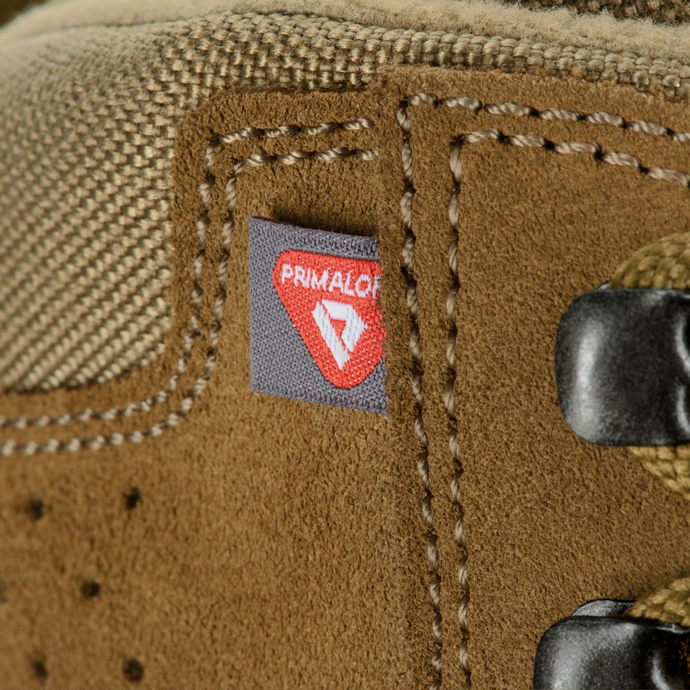 M-Tac tactical winter boots with rugged design, waterproof material, and insulated lining for cold weather outdoor activities.
