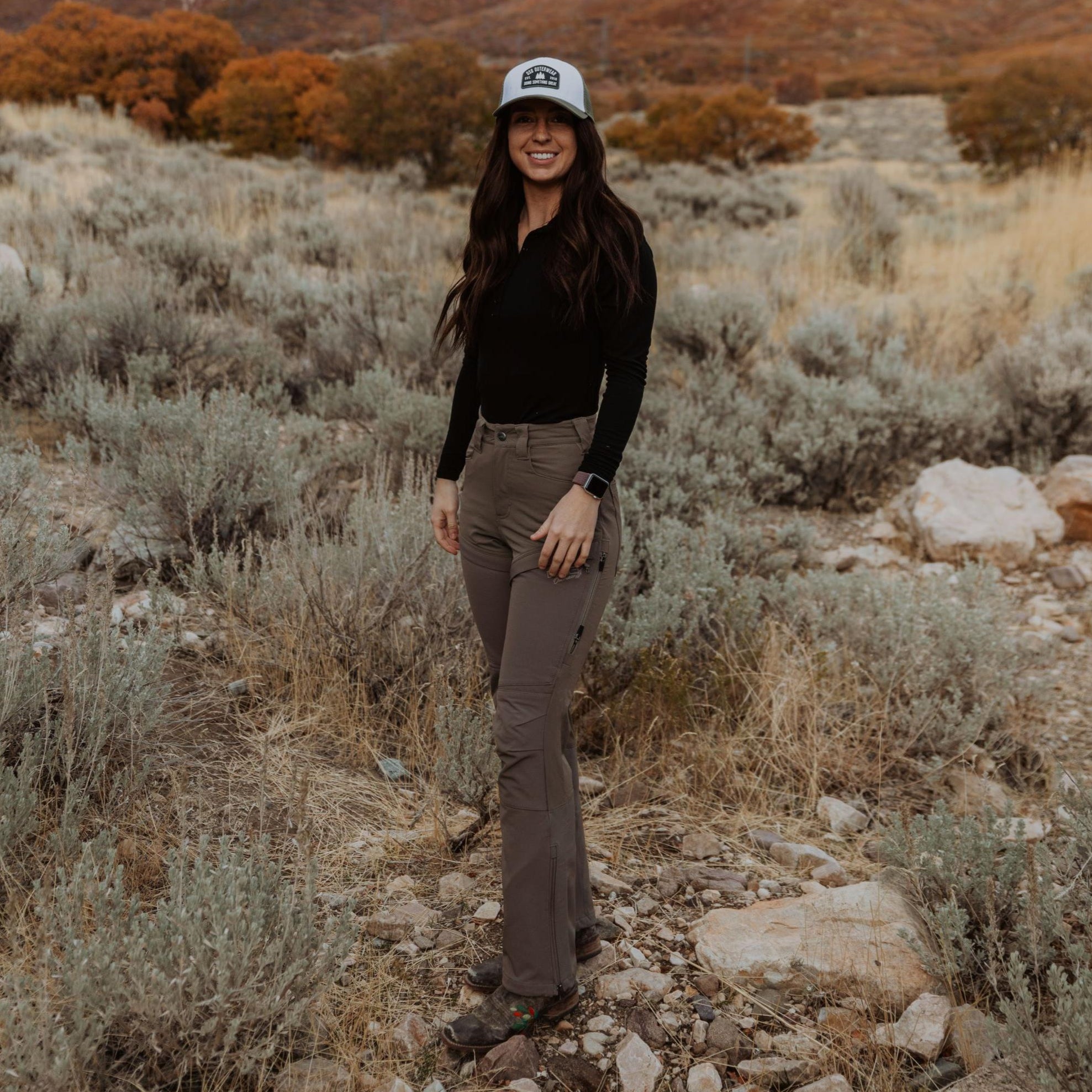 DSG OUTERWEAR Kortni Upland Pant in earthy fabric with a relaxed fit and cargo style, displayed on a model.