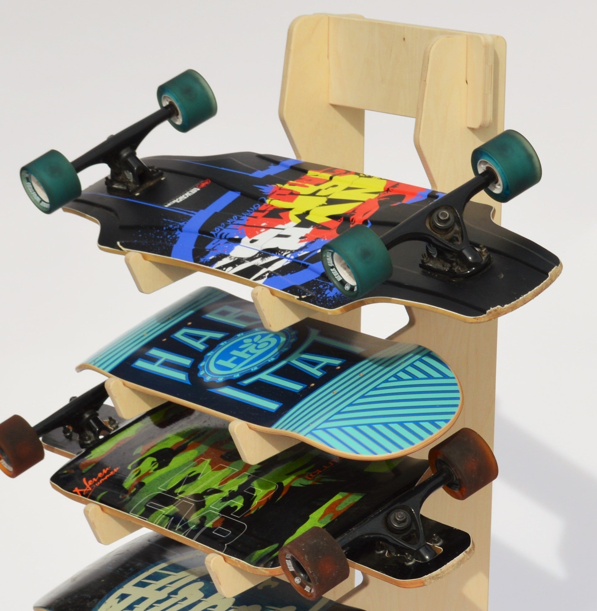 Rado Racks Boardroom skateboard floor rack holding multiple skateboards in a modern, organized display.