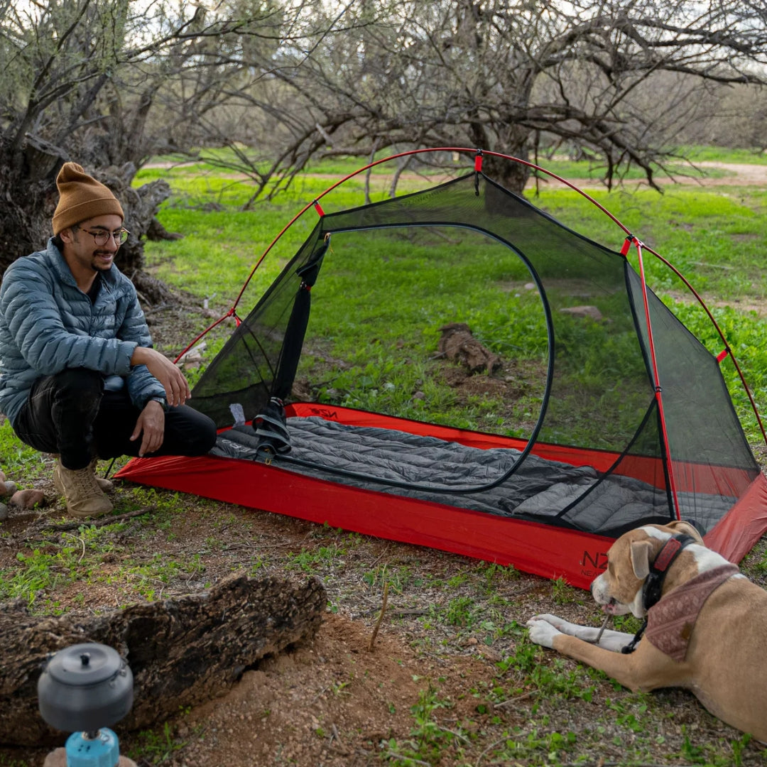 Near Zero Outdoor Gear 1P DynaLite Tent set up outdoors, showcasing lightweight, compact camping tent with rainfly and mesh panels.