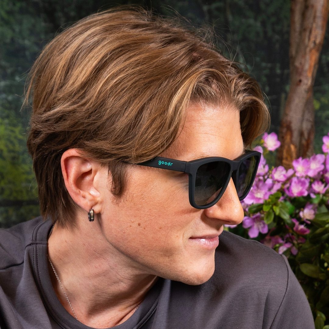 Lifestyle image of Rare Air Discs 90s Sedan Style Icon polarized sunglasses, showcasing their sleek design and classic 90s-inspired look.