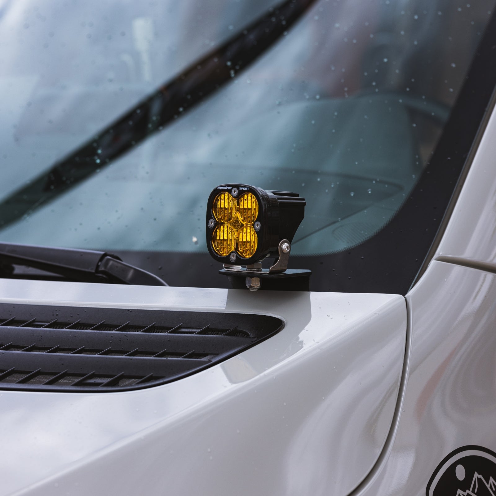 Sprinter Hood Light Mount Kit by The Van Mart, featuring durable brackets and hardware for easy installation on van hoods.