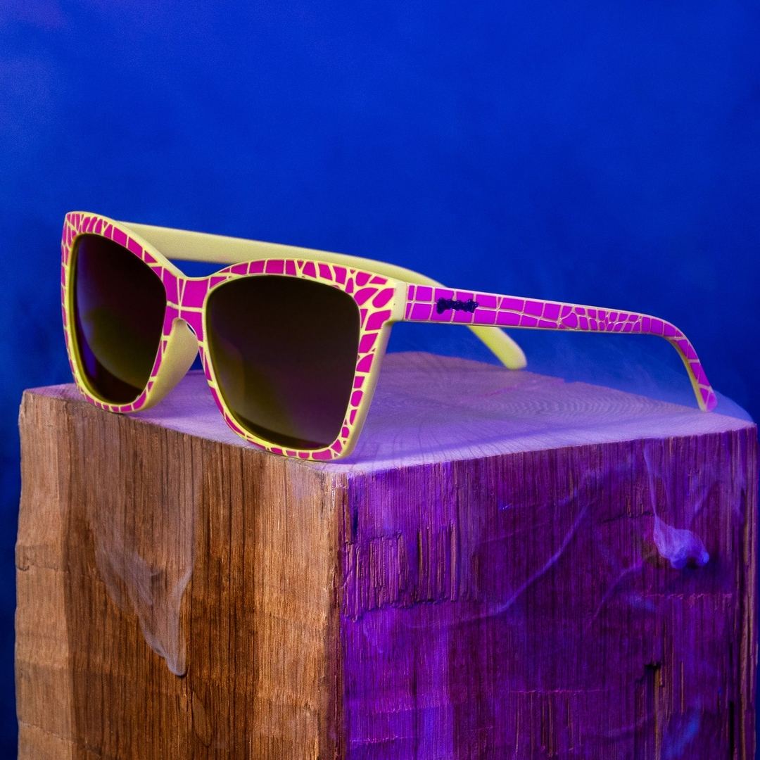 Rare Air Discs Croco-Dial For A Good Time polarized G Sunglasses, lifestyle shot showing stylish accessories with crocodile-pattern frames.