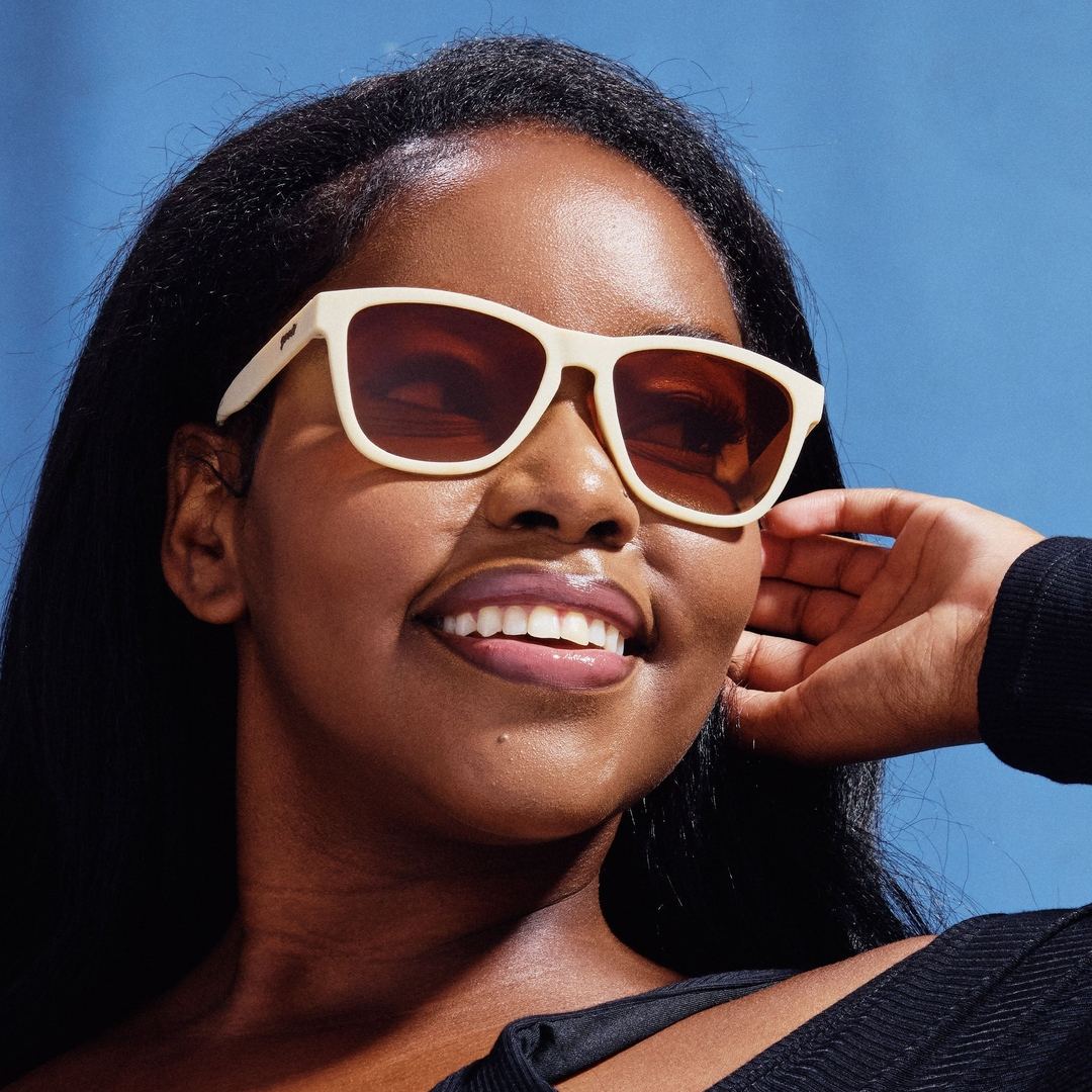 Lifestyle image of Rare Air Discs Toasted Marshmallow Magic OG polarized sunglasses showing stylish frame and tinted lenses.