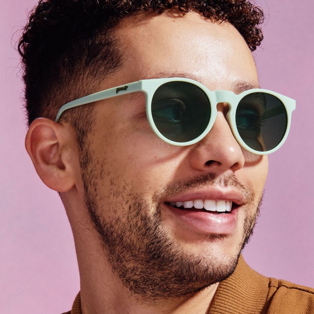 Rare Air Discs Incognito Plant Parent Circle G polarized sunglasses, lifestyle image showing black frame and tinted lenses.
