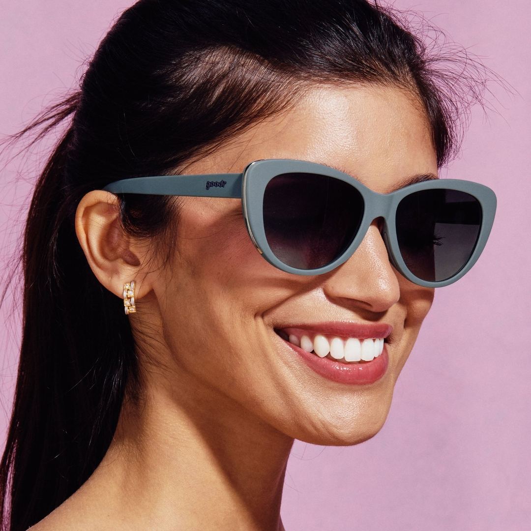 Rare Air Discs Diet Black Glam G polarized sunglasses with sleek black frames and tinted lenses, worn as stylish accessories.