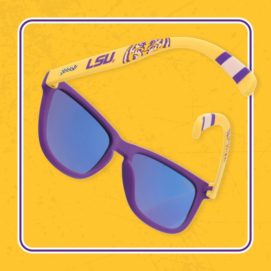 Rare Air Discs LSU "Geaux Tigers" polarized sunglasses worn by a person outdoors, showcasing the black frame and LSU logo.
