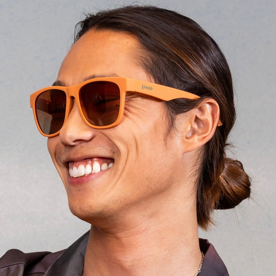 Rare Air Discs Mayor of Pangaea BFG polarized sunglasses shown in a lifestyle setting with stylish outdoor accessories.