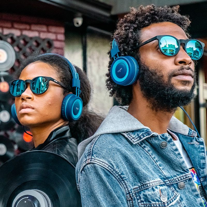 Rare Air Discs Midnight Ramble at Circle Bar polarized sunglasses with black frames and tinted lenses in a lifestyle setting.
