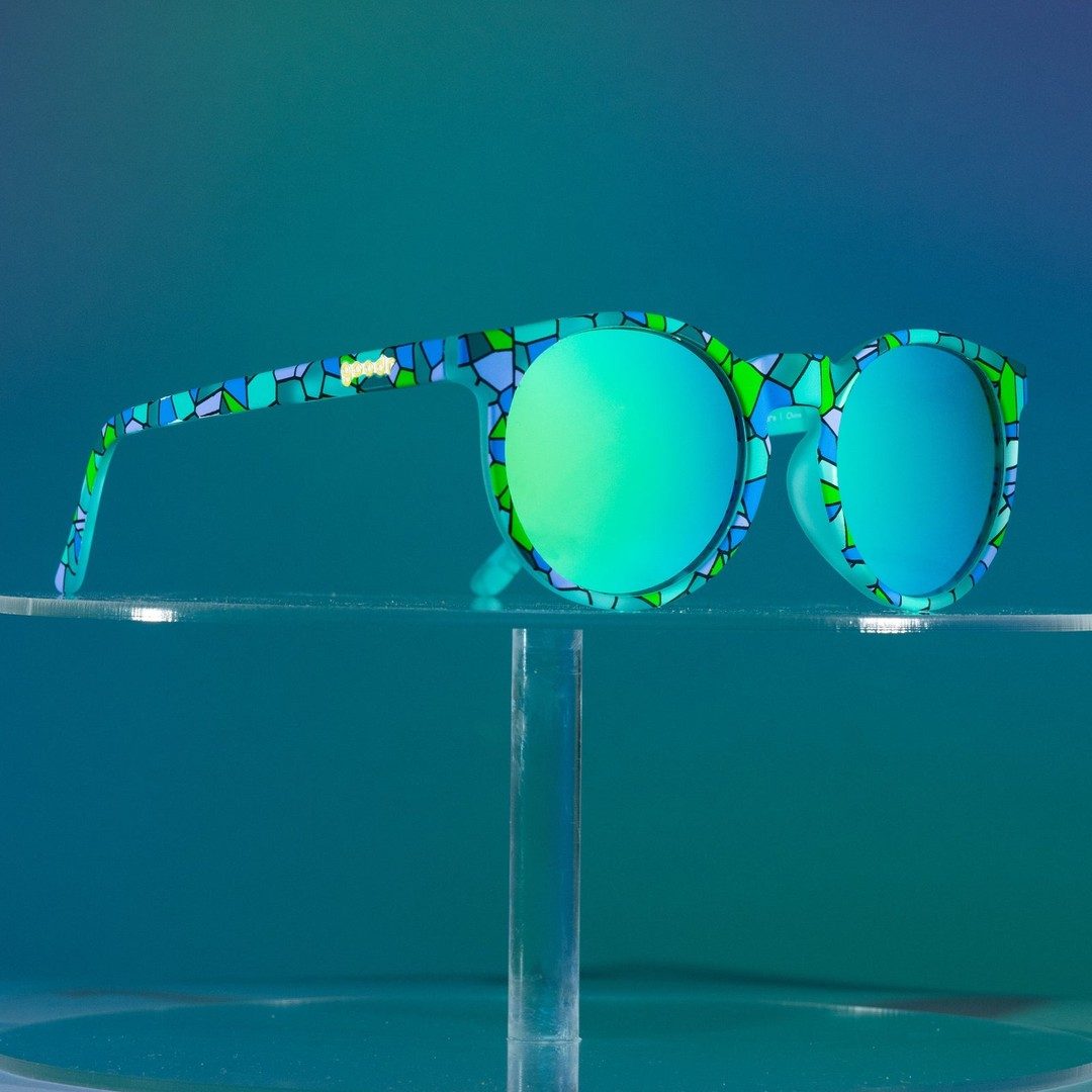 Rare Air Discs Moody Mosaic Musings Limited Circle G polarized sunglasses worn outdoors, featuring a colorful mosaic design.