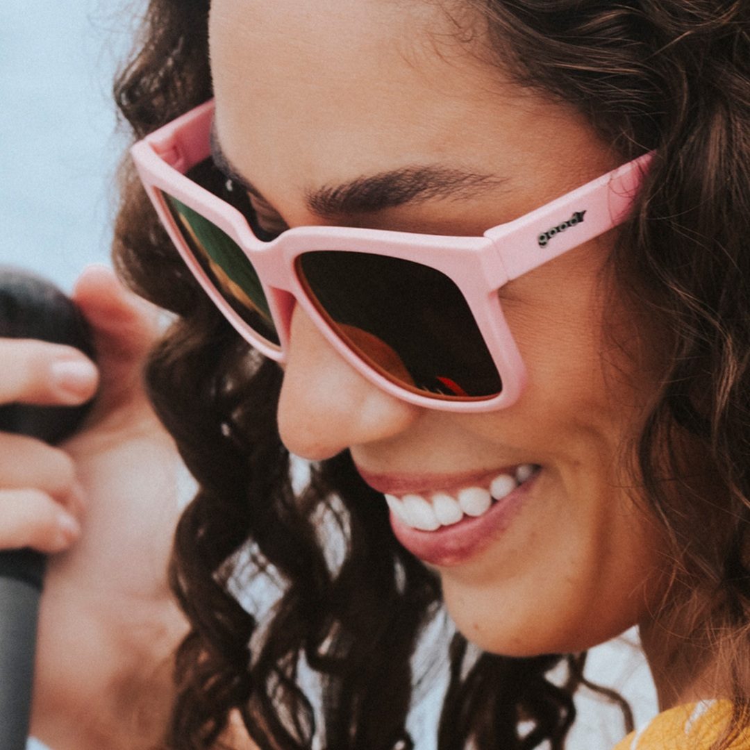Rare Air Discs Pool Noodle Battle Hero Tidal G polarized sunglasses floating on water, showcasing sporty accessories with vibrant design.