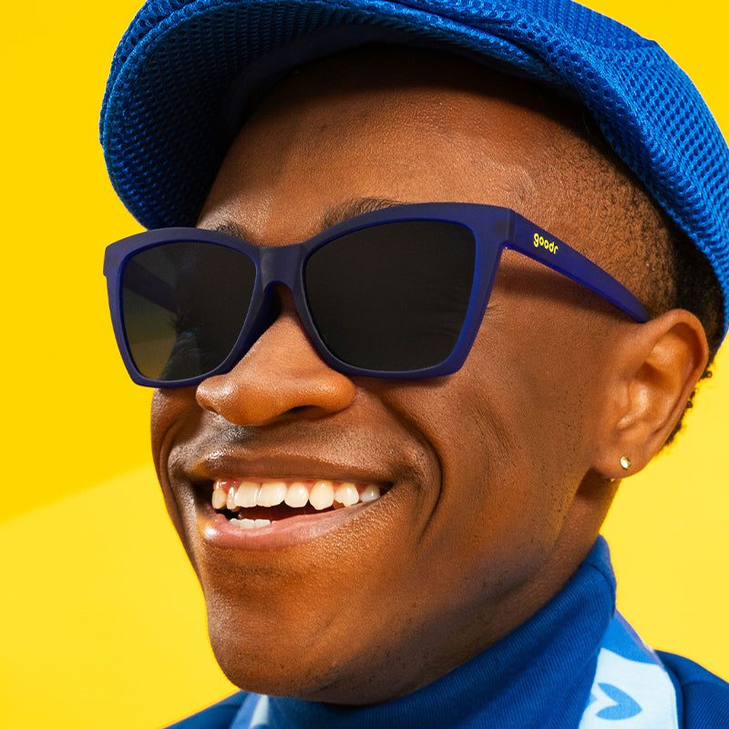 Rare Air Discs Pop Art Prodigy polarized sunglasses with bold colorful frames, shown in a lifestyle setting.