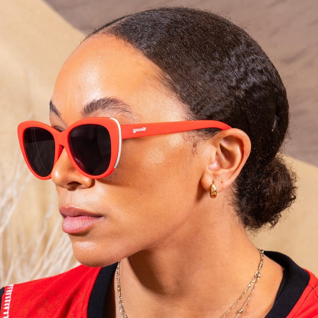 Orange Glam G Polarized sunglasses with cherry stem and tongue accessories by Rare Air Discs, stylish eyewear for outdoor wear.