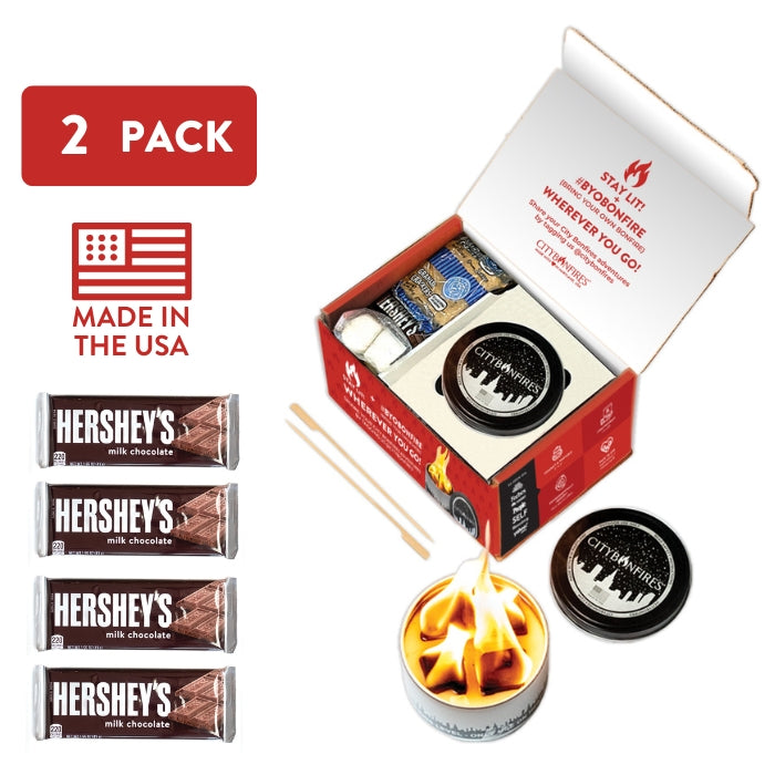 City Bonfires S'mores Night Pack with two bars and marshmallows set in an outdoor setting ready for roasting.