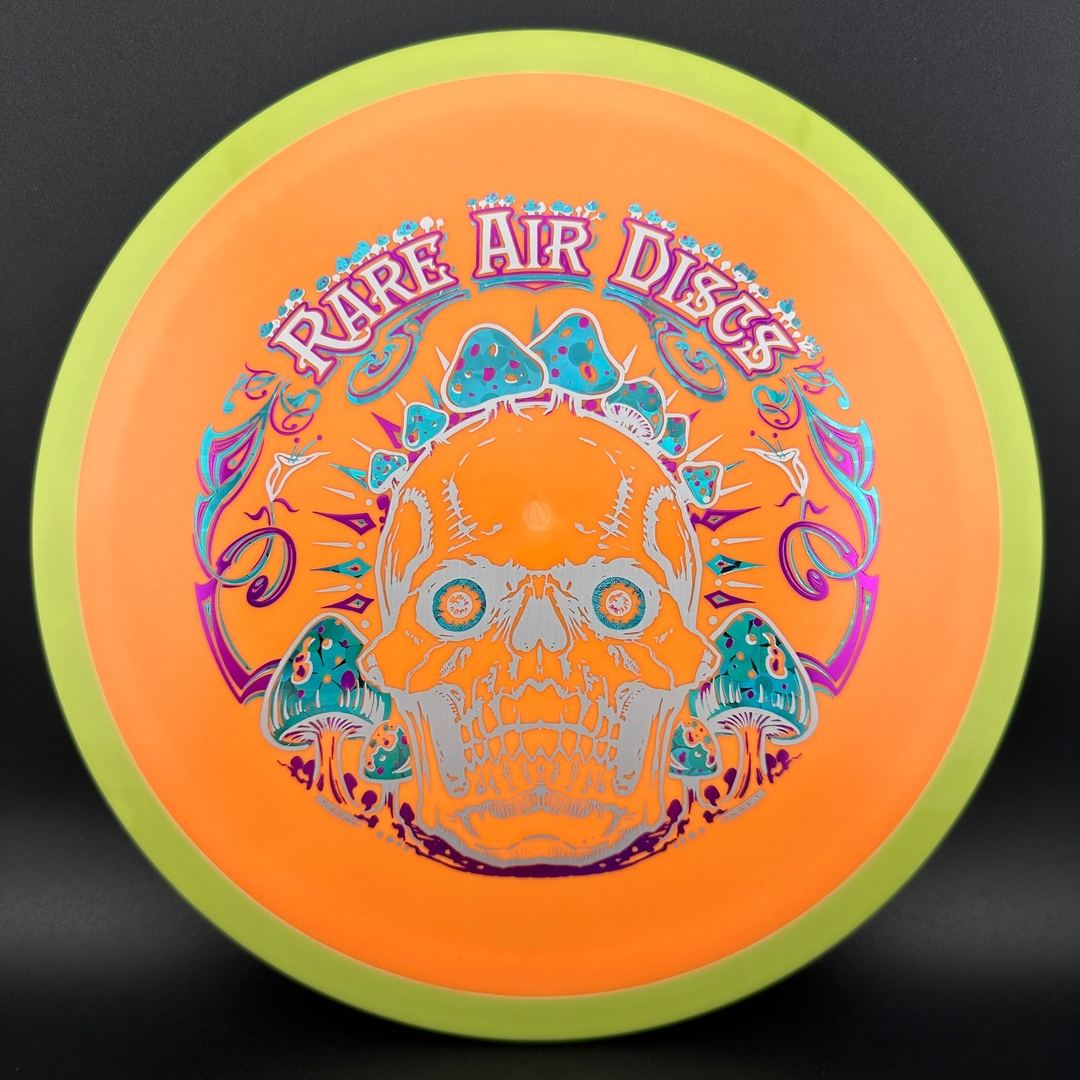 Fission Defy Crushin' Amanitas VIP 2.0 disc golf disc by Rare Air Discs, featuring vibrant artwork and durable plastic.