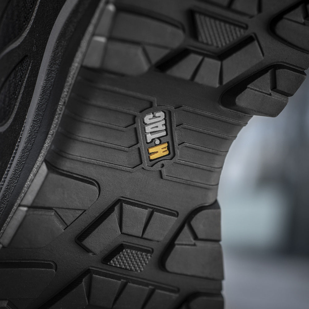 M-TAC Tactical Summer Boots Iva displayed on a surface, showcasing durable design and tactical features for outdoor and tactical use.