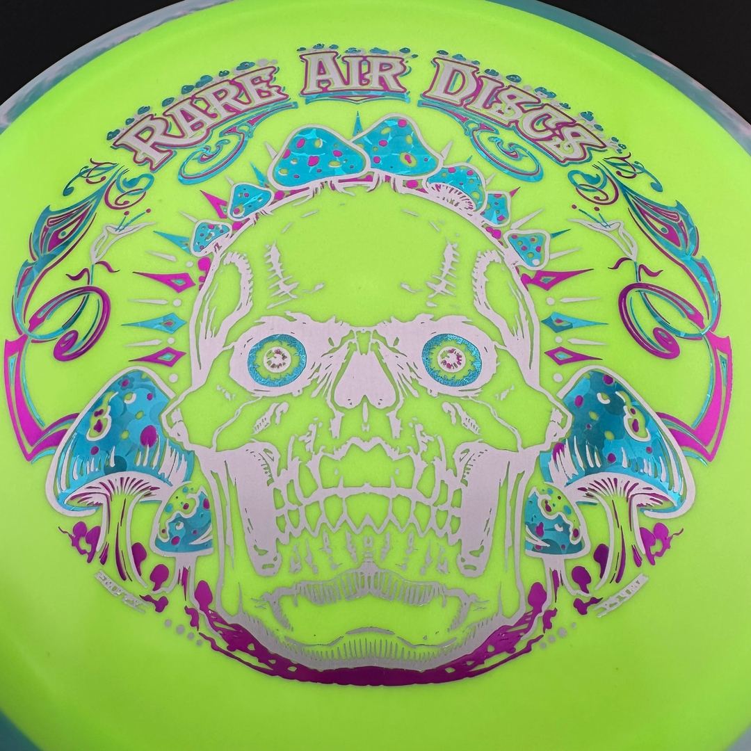 Rare Air Discs Fission Defy Crushin' Amanitas VIP 2.0 disc golf disc with colorful design and bold lettering.