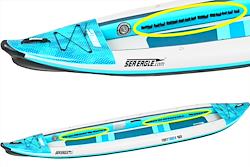 Backcountry Sportsman 465ft FastTrack™ V-bottom two-person kayak on calm water with paddles ready for use.