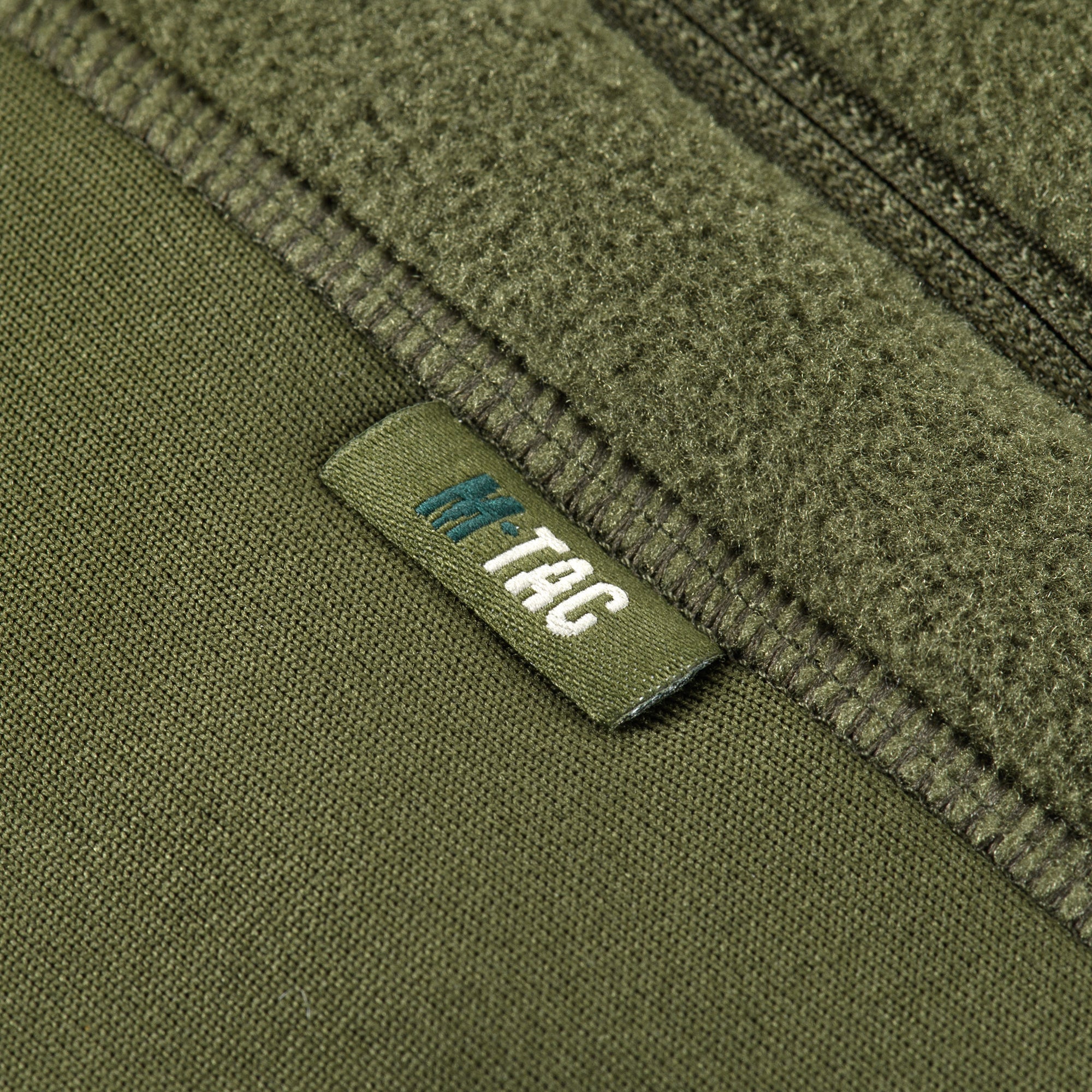 M-TAC fleece jacket made from Polartec fabric, featuring a sporty design and comfortable fit for outdoor activities.