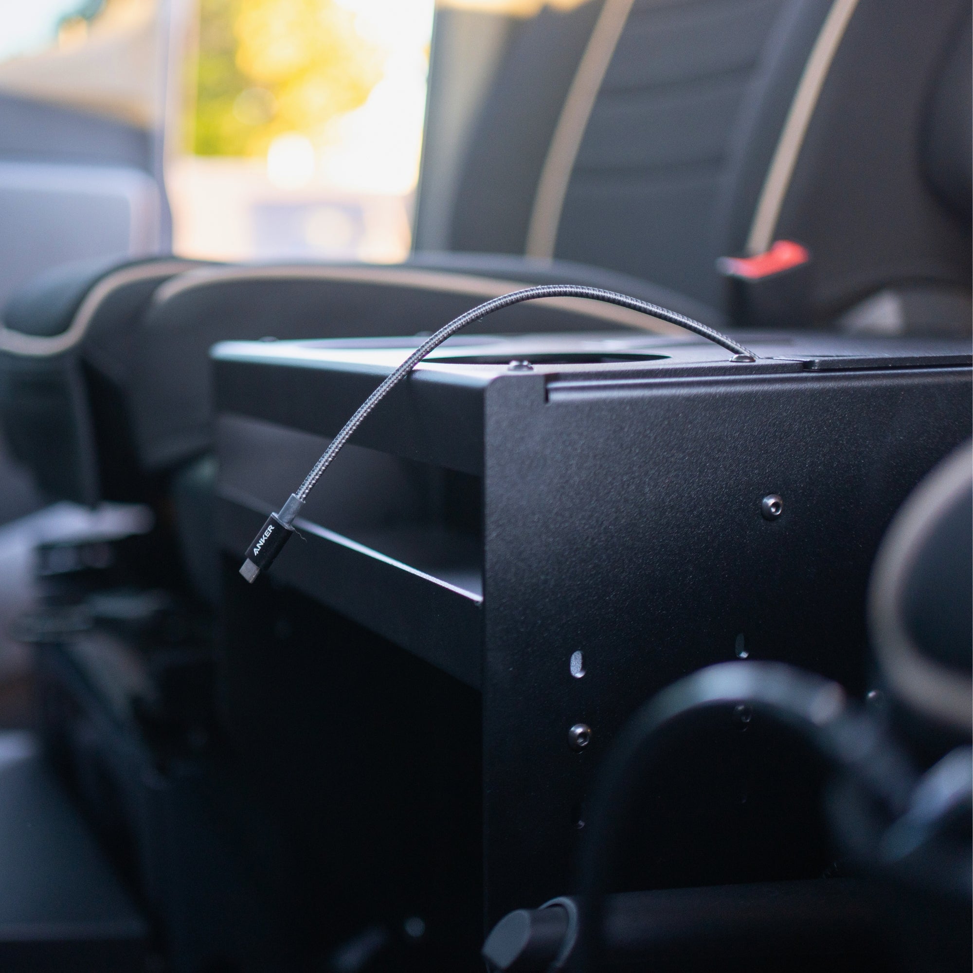 Sprinter Scout Center Console Box by The Van Mart, showcasing a durable storage solution for Sprinter van interiors.
