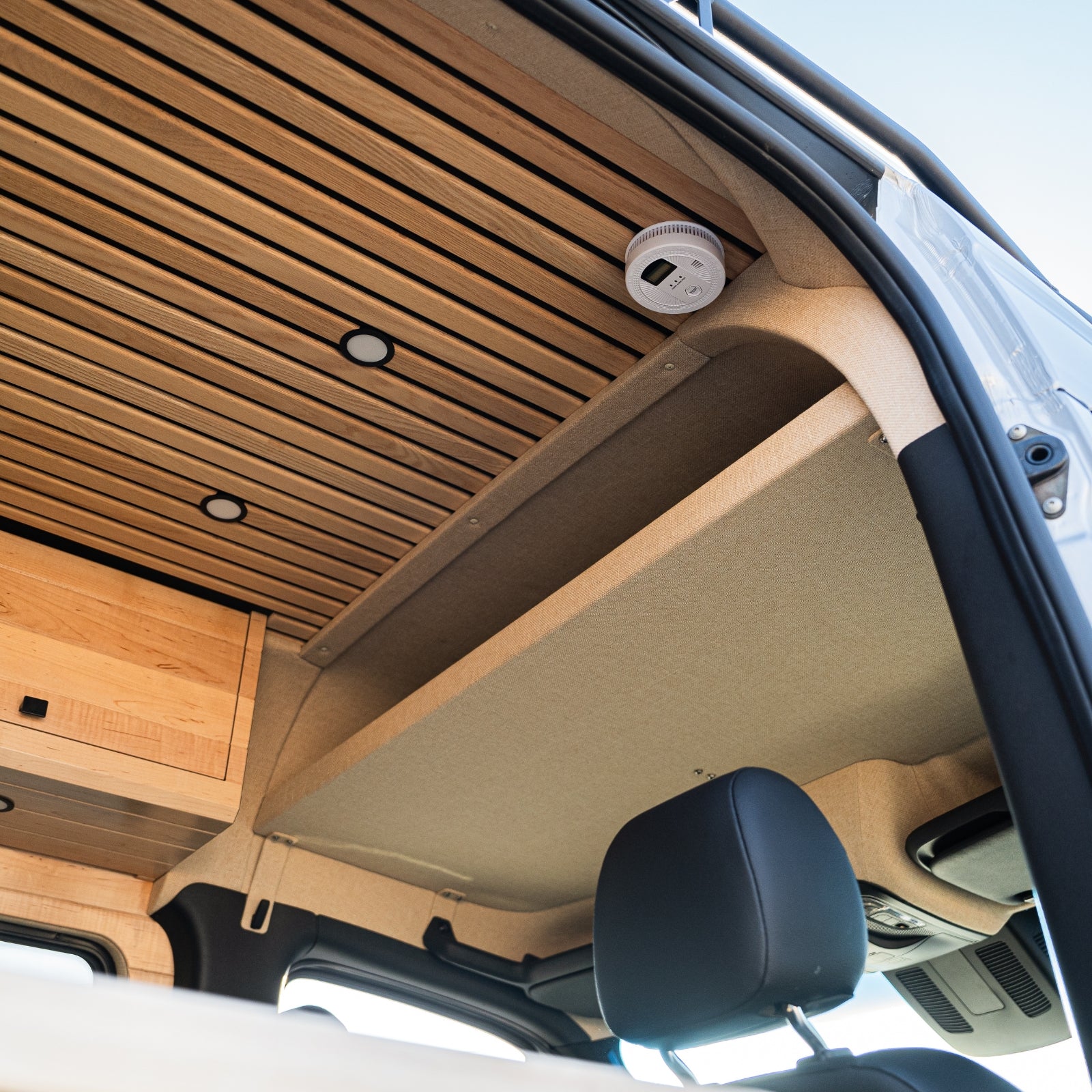 Sprinter headliner shelf from The Van Mart's VanSpeed DIY Collection, showcasing a sleek design for van storage solutions.