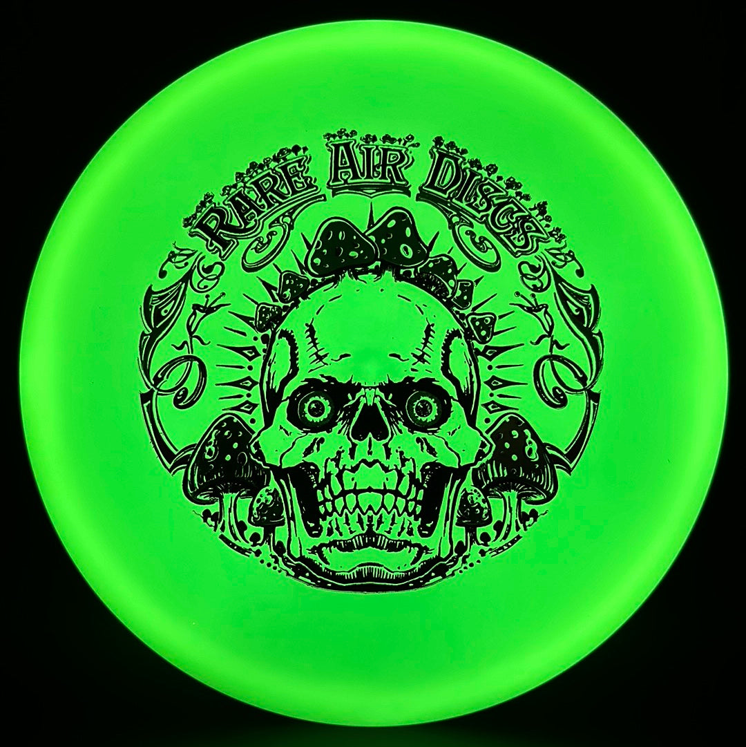 Forged Radiant Supra disc golf disc by Rare Air Discs featuring Crushin' Amanitas stamp, with vibrant colorful design.
