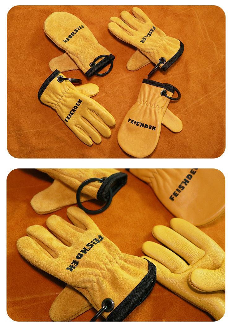 Vintage handcrafted leather motorcycle glove keychain from FEISHDEK™ with decorative details, ideal for motorcycle enthusiasts.