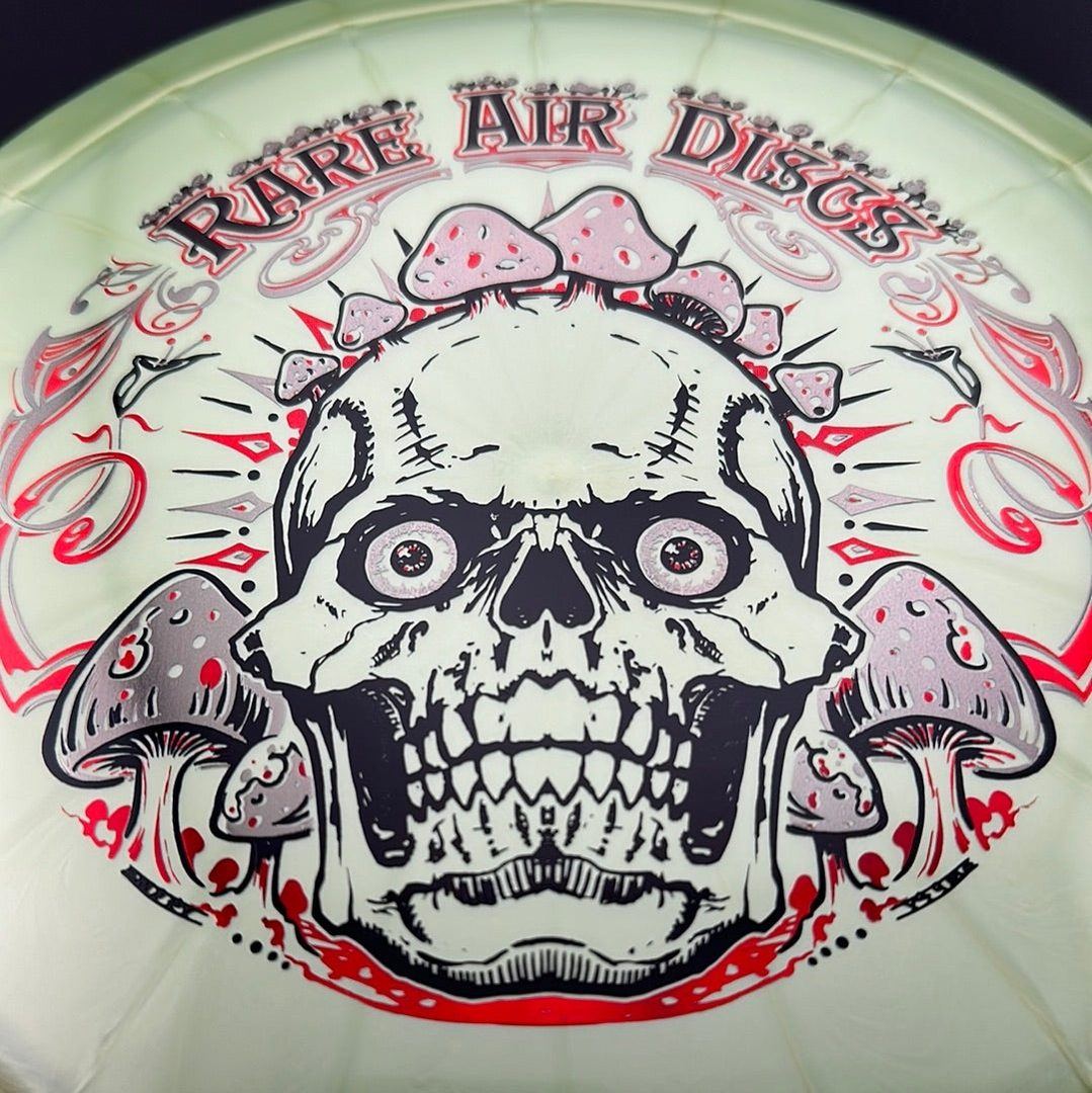 Ethereal Construct Crushin' Amanitas disc golf stamp by Manny Trujillo on a Rare Air Discs disc, featuring vibrant mushroom artwork.