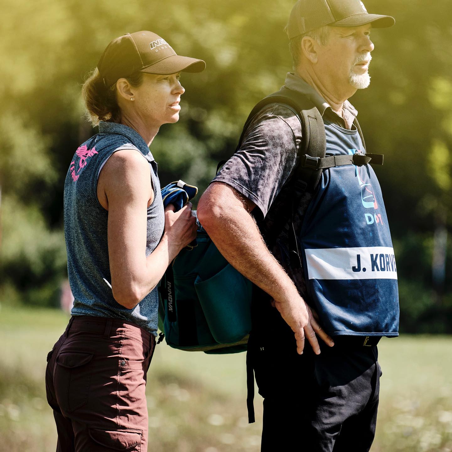 Gotta Go Gotta Throw Revolution Carolina Team V3 disc golf bag in Golden Dream with multiple compartments and padded shoulder strap
