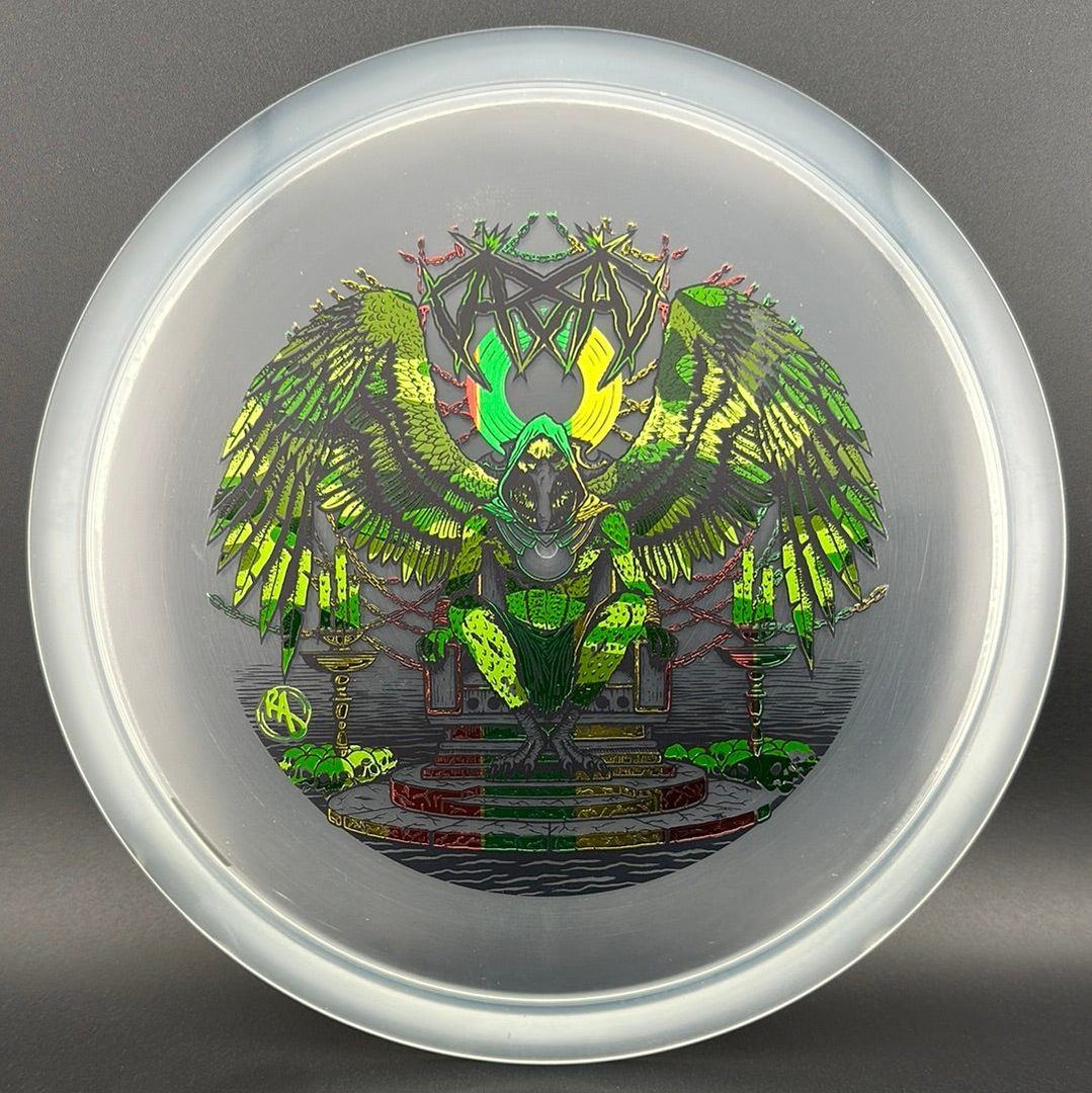 CryZtal Buzzz disc golf disc by Rare Air Discs featuring Karudi the Overseer artwork, transparent CryZtal material, and vibrant design.