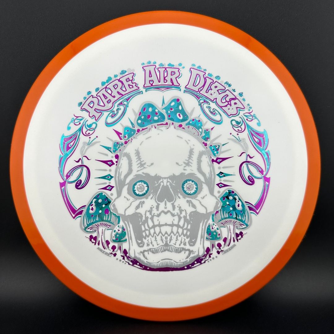 Rare Air Discs Fission Defy Crushin' Amanitas VIP 2.0 disc golf disc with vibrant design and durable construction.