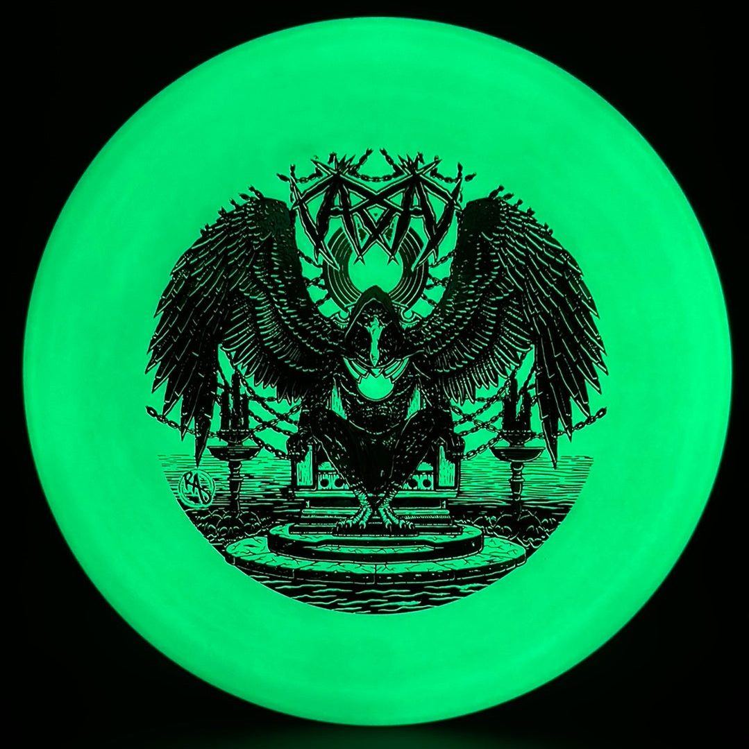 Disc golf disc from Rare Air Discs, ESP Glo Buzzz Karudi the Overseer by Ripper Studios, featuring vibrant glow-in-the-dark design.
