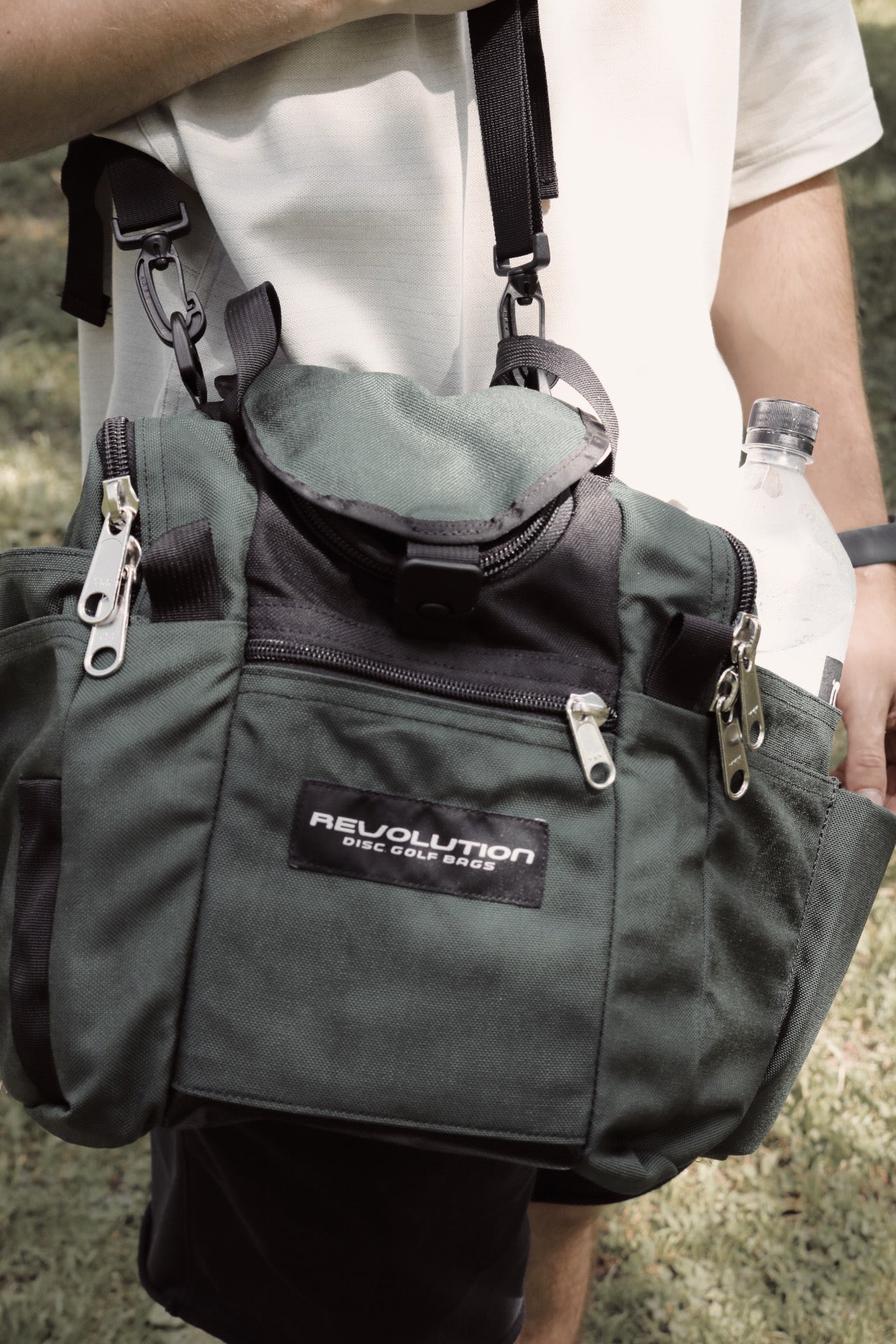 Gotta Go Gotta Throw Revolution Mini Deluxe V3 Disc Golf Bag in Lapis blue with multiple compartments and adjustable straps.