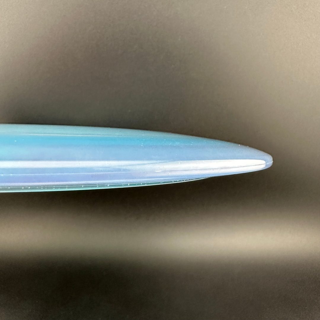 Rare Air Discs Gummy C-Blend Aztec disc golf disc in vibrant colors, designed for accuracy and control in disc golf gameplay.