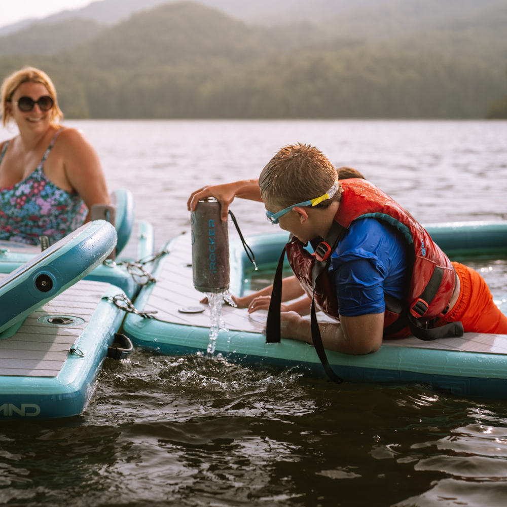 iROCKER US MAG SPEAKER X compact portable Bluetooth speaker with textured black exterior and control buttons