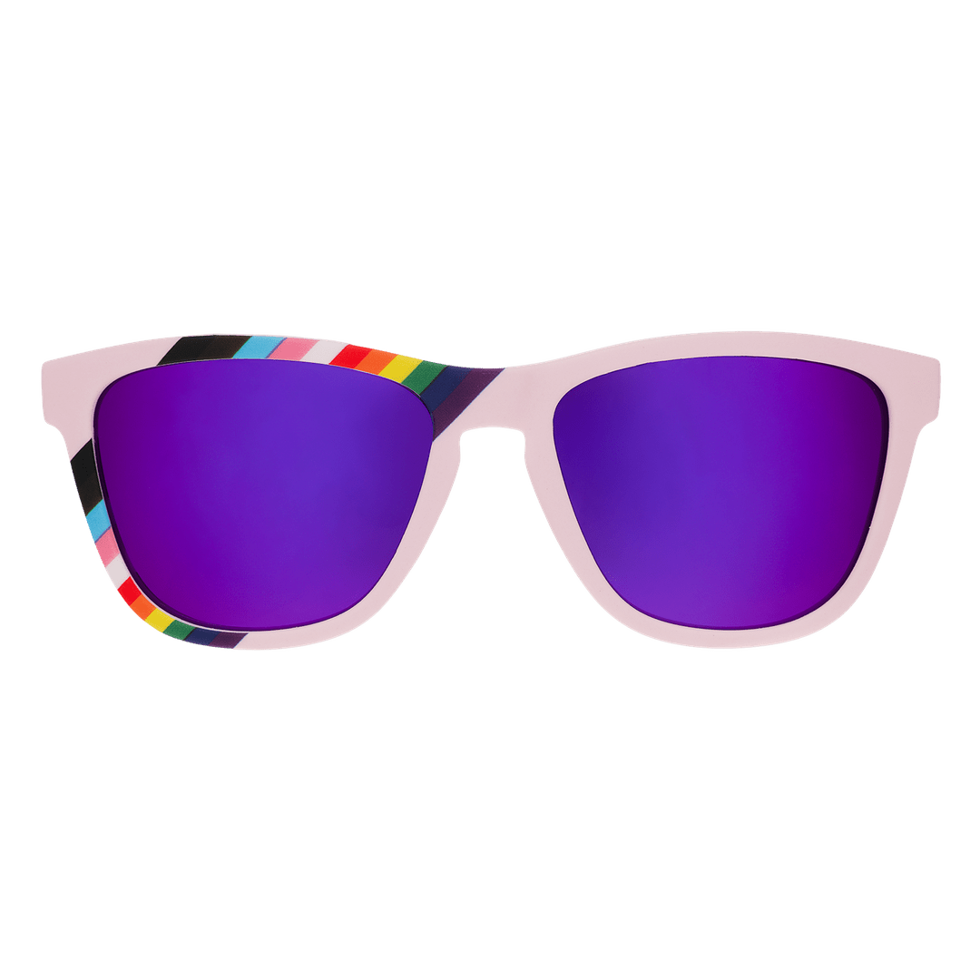 Transparent polarized sunglasses with "We're Here To Slay" logo, stylish accessories from Rare Air Discs for Pride Fest '25.