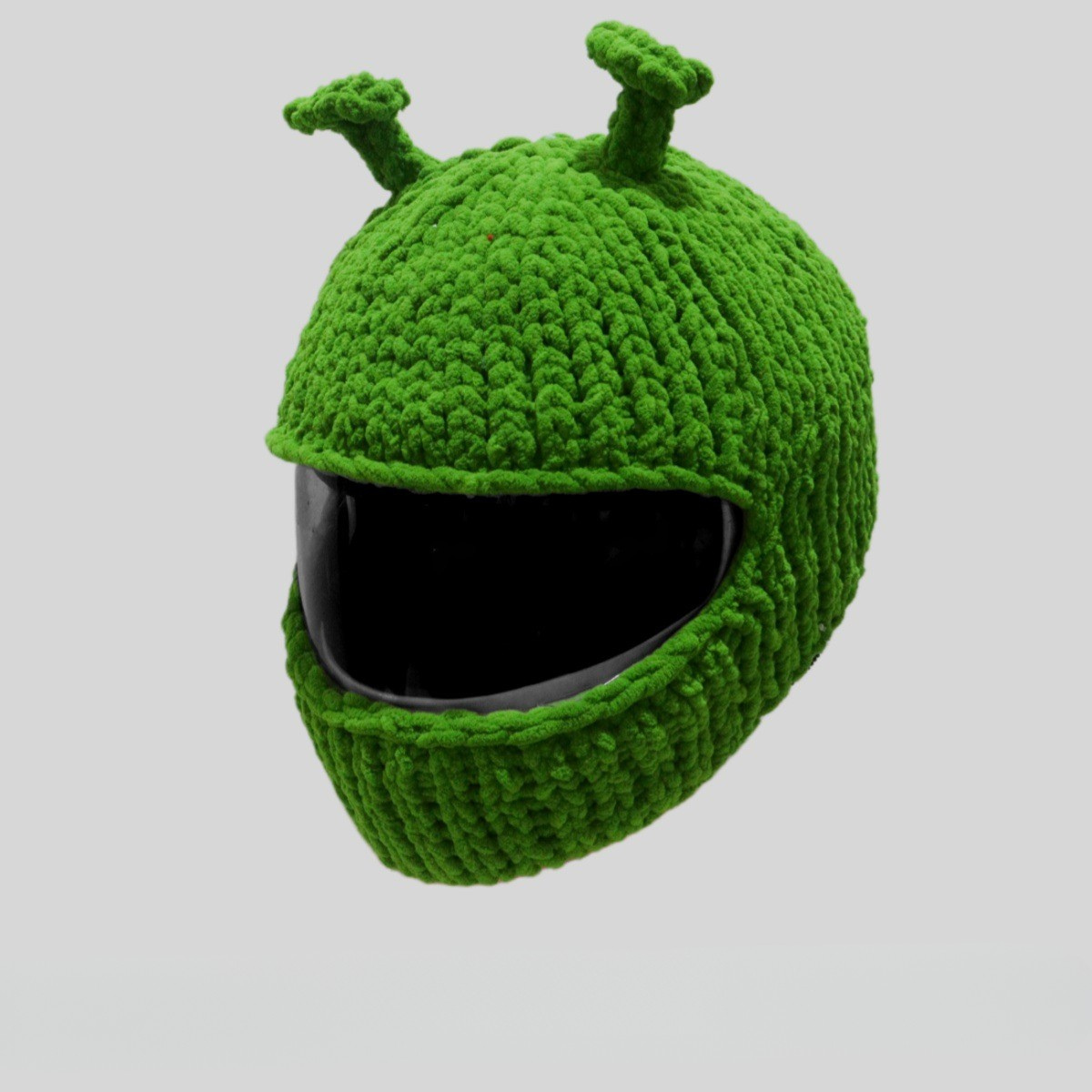 Handmade knitted little devil helmet cover by Bean's Moto Booth, colorful, snug-fit helmet accessory with devil horn design.