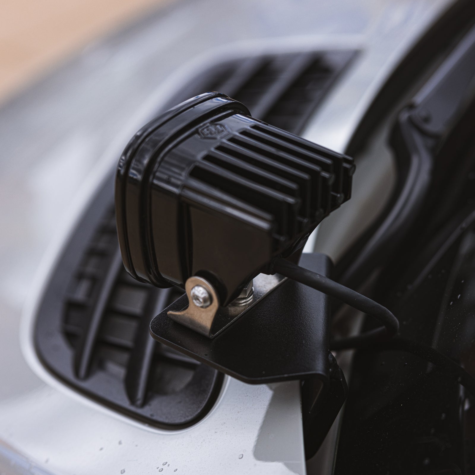 Sprinter Hood Light Mount Kit by The Van Mart, featuring durable brackets and easy installation for vehicle lighting.