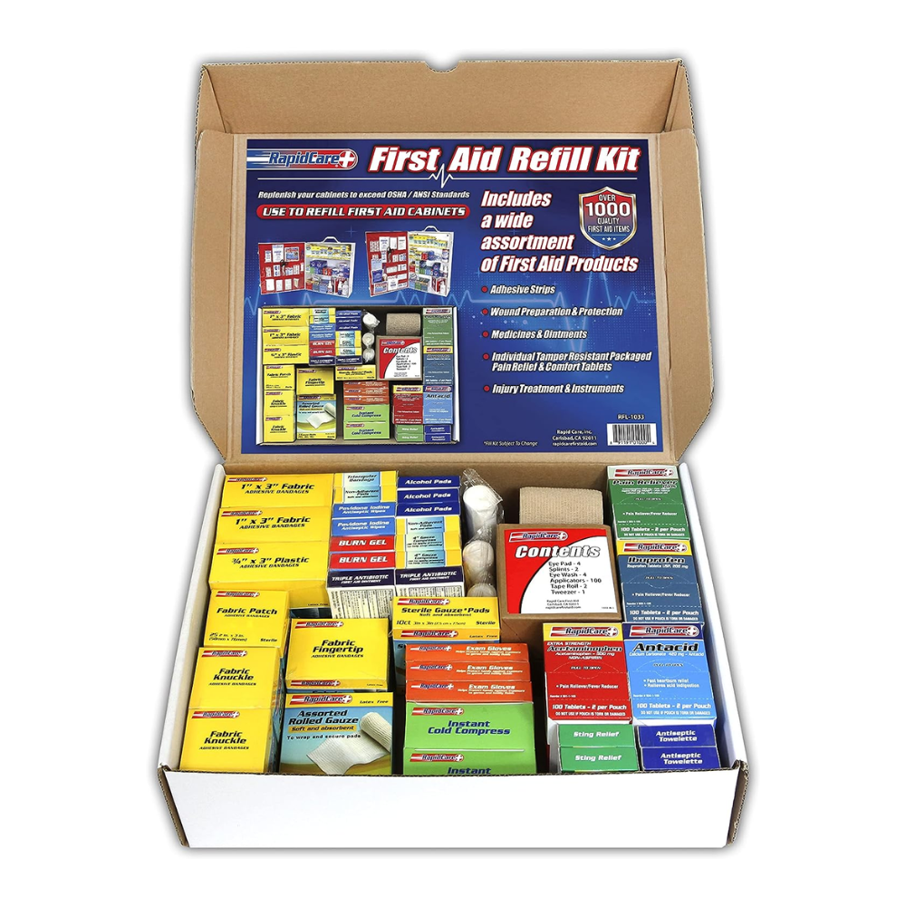 XL Rapid Care First Aid Refill Kit with 1033 pieces displayed in organized 4-shelf design for easy access.