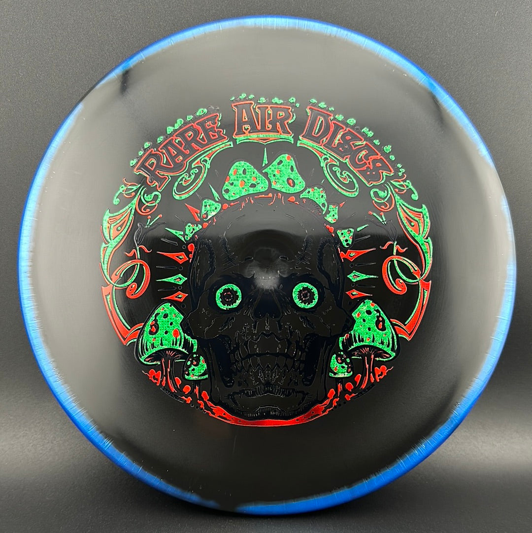 Disc golf Halo S-Blend Tomb stamp by Manny Trujillo, featuring Crushin' Amanitas design on a Rare Air Discs disc.