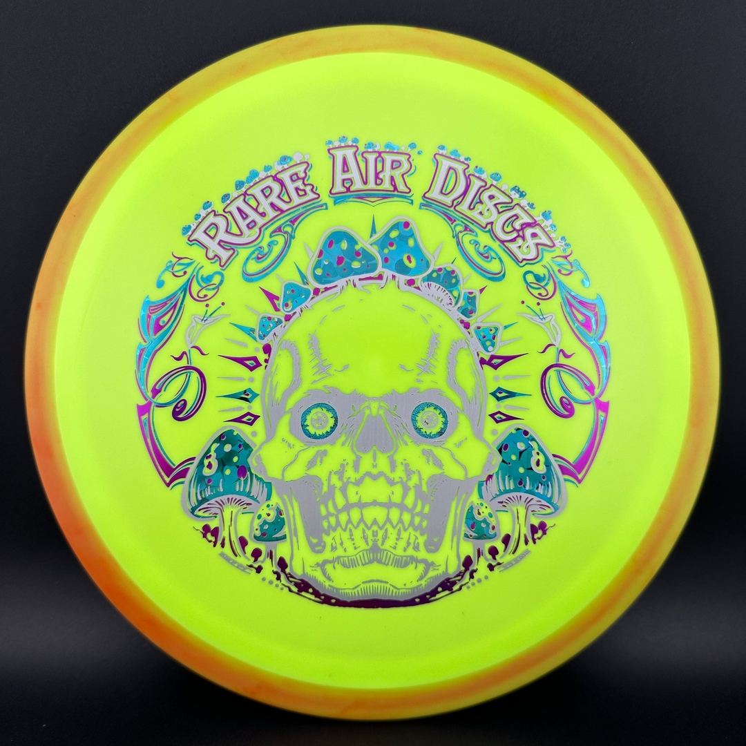 Rare Air Discs Fission Defy Crushin' Amanitas VIP 2.0 disc golf disc with vibrant artwork and sleek design.