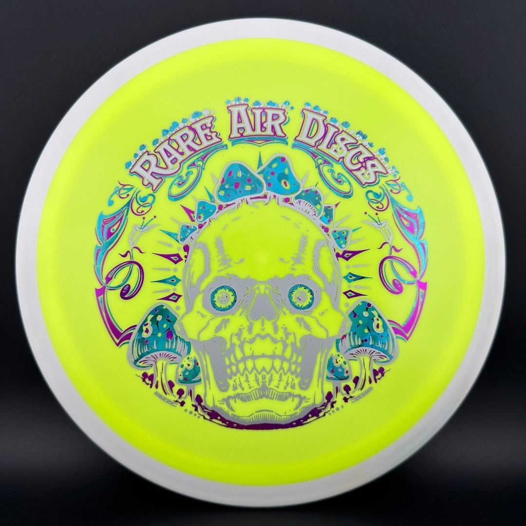 Rare Air Discs Fission Defy Crushin' Amanitas VIP 2.0 disc golf disc with vibrant design and dynamic graphics.